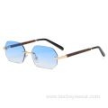 New European and American fashion frameless polygon Sunglasses Women's gradually changing color Sunglasses trend wood grain leg